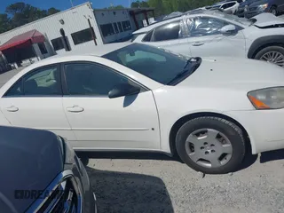 2006 Pontiac G6 6-Cyl z VIN 1G2ZG558264213214, wystawiony jako IAAI lot #42044349 z przebiegiem 138 725 mil mil oraz . Historia ofert i sprzedaży dostępna na DreamBid. Obrazek 13.