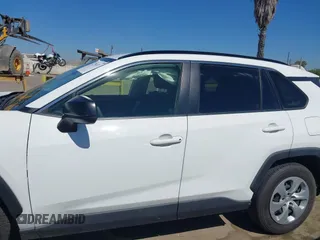 2019 Toyota RAV4 LE with VIN JTMH1RFV4KJ015962, listed as a IAAI auction lot 42714711 with 26,089 mi miles and . Bid and sale history available at DreamBid. Image 14.