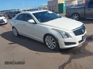 2014 Cadillac ATS Luxury RWD with VIN 1G6AB5SXXE0109744, listed as a IAAI auction lot 41656539 with 76,049 mi miles. Bid and sale history available at carsss.com. Image 1.