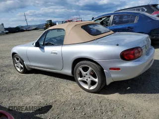 2001 Mazda MX-5 Miata with VIN JM1NB353810204843, listed as a Copart auction lot 51855565 with 147,012 mi miles and Salvage Title. Bid and sale history available at DreamBid. Image 2.