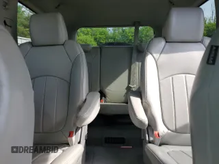 2013 Chevrolet Traverse LTZ z VIN 1GNKVLKD6DJ107802, wystawiony jako Copart lot #58519305 z przebiegiem 157 046 mil mil oraz Czysty tytuł • Clean title. Historia ofert i sprzedaży dostępna na DreamBid. Obrazek 10.