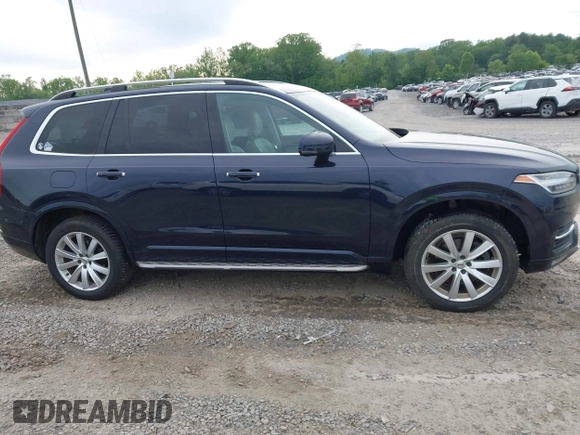 2016 Volvo XC90 T6 Momentum with VIN YV4A22PK7G1058660, listed as a IAAI auction lot 42201130 with 130,487 mi miles. Bid and sale history available at carsss.com. Image 14.