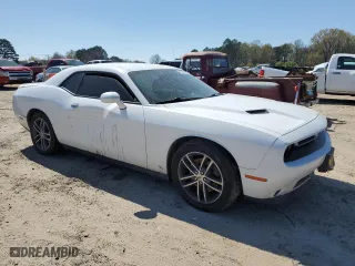 2019 Dodge Challenger SXT with VIN 2C3CDZGG6KH655517, listed as a Copart auction lot 47327064 with 69,899 mi miles and Salvage Title. Bid and sale history available at carsss.com. Image 4.