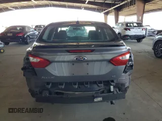 2012 Ford Focus SE with VIN 1FAHP3F28CL114572, listed as a Copart auction lot 63053035 with 142,994 mi miles and Salvage title. Bid and sale history available at DreamBid. Image 6.