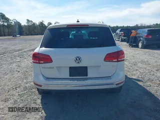 2016 Volkswagen Touareg Sport with VIN WVGEF9BP5GD012680, listed as a IAAI auction lot 41610943 with 153,952 mi miles and . Bid and sale history available at DreamBid. Image 16.