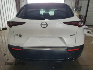 2023 Mazda CX-30 S Select z VIN 3MVDMBBM2PM521471, wystawiony jako Copart lot #63272965 z przebiegiem 26 879 mil mil oraz Szkoda całkowita • Salvage title. Historia ofert i sprzedaży dostępna na DreamBid. Obrazek 6.