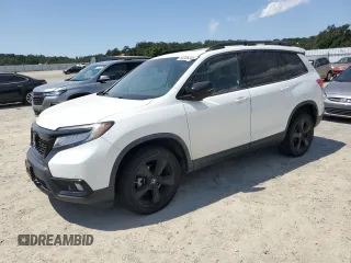 2021 Honda Passport Elite with VIN 5FNYF8H03MB007617, listed as a Copart auction lot 63036345 with 21,757 mi miles and Salvage title. Bid and sale history available at DreamBid. Image 1.