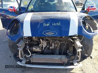 2016 MINI Hardtop 4 Door z VIN WMWXU1C54G2D09582, wystawiony jako IAAI lot #41754947 z przebiegiem 113 405 mil mil oraz . Historia ofert i sprzedaży dostępna na DreamBid. Obrazek 6.