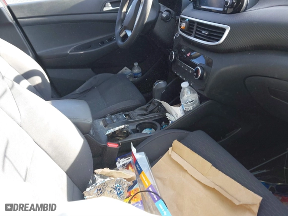 2020 Hyundai Tucson Value with VIN KM8J3CA42LU149811, listed as a IAAI auction lot 41642255 with 60,936 mi miles. Bid and sale history available at carsss.com. Image 5.