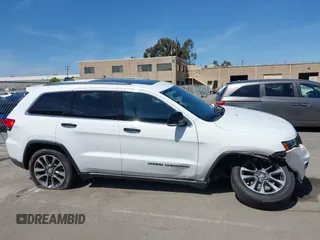 2018 Jeep Grand Cherokee Limited with VIN 1C4RJFBG3JC245943, listed as a IAAI auction lot 42287279 with 107,719 mi miles and . Bid and sale history available at DreamBid. Image 13.