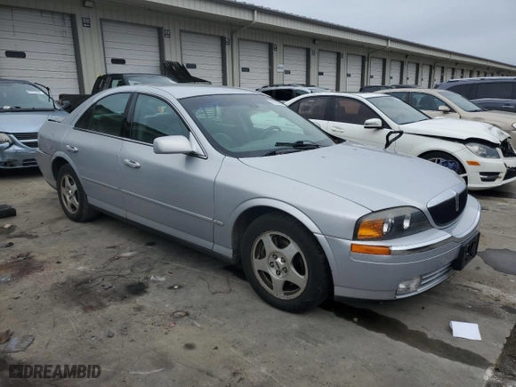 2000 Lincoln LS with VIN 1LNHM86SXYY773355, listed as a Copart auction lot 82223964 with 0 mi miles and Salvage Title. Bid and sale history available at carsss.com. Image 4.