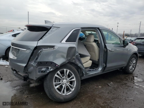 2023 Cadillac XT5 AWD Premium Luxury with VIN 1GYKNDRS6PZ195222, listed as a Copart auction lot 43034615 with 12,052 mi miles and Salvage Title. Bid and sale history available at carsss.com. Image 3.