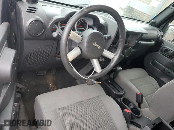 2008 Jeep Wrangler Unlimited Rubicon with VIN 1J4GA691X8L590979, listed as a Copart auction lot 57840575 with 195,458 mi miles and Salvage title. Bid and sale history available at DreamBid. Image 8.