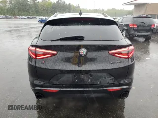2020 Alfa Romeo Stelvio Ti z VIN ZASPAKBN9L7C94128, wystawiony jako Copart lot #56129775 z przebiegiem 54 042 mil mil oraz Szkody całkowita. Historia ofert i sprzedaży dostępna na DreamBid. Obrazek 6.