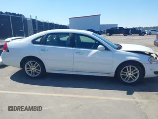 2016 Chevrolet Impala LTZ with VIN 2G1WC5E35G1129487, listed as a IAAI auction lot 41731219 with 173,991 mi miles and . Bid and sale history available at DreamBid. Image 13.