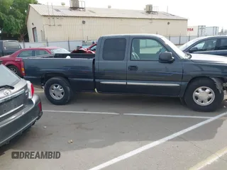 2003 GMC Sierra 1500 SLT with VIN 2GTEC19TX31404836, listed as a IAAI auction lot 42011067 with 233,458 mi miles and . Bid and sale history available at carsss.com. Image 14.