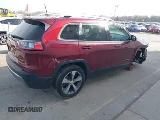 2020 Jeep Cherokee Limited z VIN 1C4PJMDX1LD531201, wystawiony jako IAAI lot #41829213 z przebiegiem 106 881 mil mil oraz . Historia ofert i sprzedaży dostępna na DreamBid. Obrazek 4.