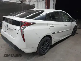 2016 Toyota Prius Two with VIN JTDKBRFU3G3513060, listed as a IAAI auction lot 41789034 with 153,391 mi miles and . Bid and sale history available at DreamBid. Image 4.