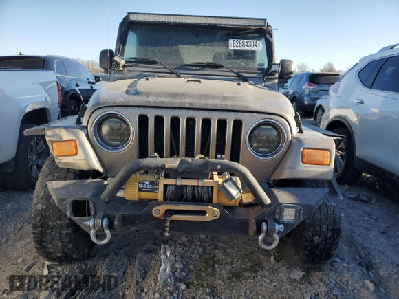2004 Jeep Wrangler Rubicon with VIN 1J4FA69S94P778836, listed as a Copart auction lot 82884304 with 168,045 mi miles and Salvage Title. Bid and sale history available at carsss.com. Image 5.