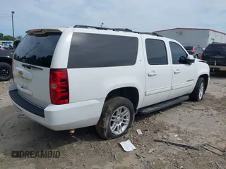 2014 Chevrolet Suburban LT with VIN 1GNSCJE08ER185472, listed as a IAAI auction lot 39849223 with 198,853 mi miles. Bid and sale history available at carsss.com. Image 4.