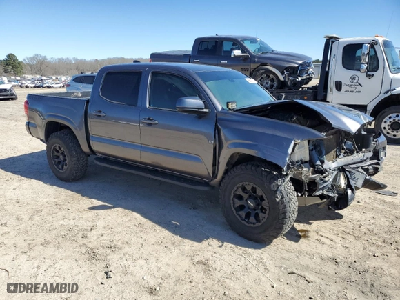 2021 Toyota Tacoma 4WD SR with VIN 5TFCZ5AN6MX252195, listed as a Copart auction lot 48234085 with 56,983 mi miles and Salvage Title. Bid and sale history available at carsss.com. Image 4.