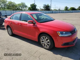 2013 Volkswagen Jetta SE with VIN 3VWDX7AJ8DM358010, listed as a Copart auction lot 56388865 with 258,482 mi miles and Salvage title. Bid and sale history available at DreamBid. Image 4.