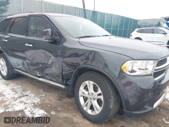 2013 Dodge Durango Crew z VIN 1C4SDJDT7DC684766, wystawiony jako IAAI lot #41277670 z przebiegiem 115 555 mil mil oraz . Historia ofert i sprzedaży dostępna na DreamBid. Obrazek 6.