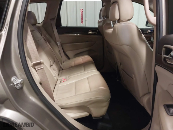 2016 Jeep Grand Cherokee Limited 75th Anniversary with VIN 1C4RJFBG6GC453307, listed as a IAAI auction lot 41657982 with 141,647 mi miles. Bid and sale history available at carsss.com. Image 8.