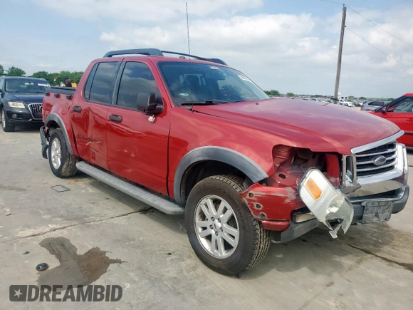 2010 Ford Explorer Sport Trac XLT z VIN 1FMEU3BE4AUF05128, wystawiony jako Copart lot #54847865 z przebiegiem Nie podano mil oraz Szkody całkowita. Historia ofert i sprzedaży dostępna na DreamBid. Obrazek 4.