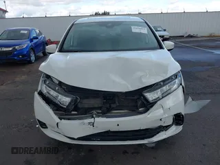 2022 Honda Odyssey Touring with VIN 5FNRL6H8XNB057293, listed as a IAAI auction lot 41826014 with 30,454 mi miles and . Bid and sale history available at DreamBid. Image 12.