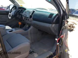 2011 Toyota Tacoma PreRunner with VIN 3TMJU4GN4BM114858, listed as a IAAI auction lot 41976639 with 296,849 mi miles and . Bid and sale history available at DreamBid. Image 5.