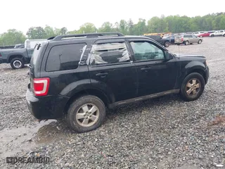 2010 Ford Escape XLT with VIN 1FMCU0DG2AKB66255, listed as a IAAI auction lot 41982329 with 192,564 mi miles. Bid and sale history available at carsss.com. Image 4.