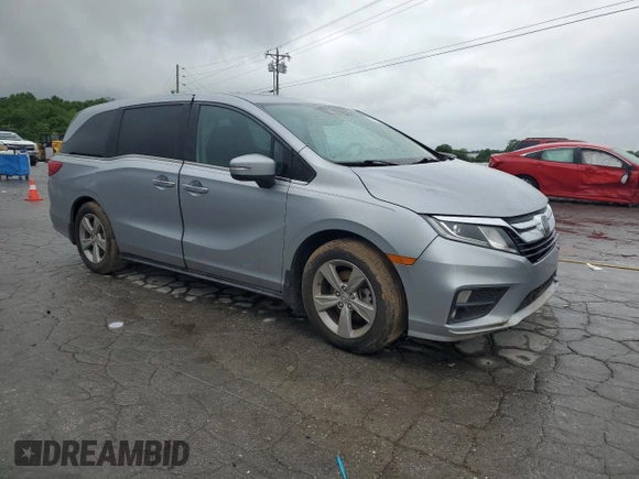 2018 Honda Odyssey EX-L z VIN 5FNRL6H74JB033475, wystawiony jako Copart lot #55736415 z przebiegiem 104 108 mil mil oraz Szkoda całkowita • Salvage title. Historia ofert i sprzedaży dostępna na DreamBid. Obrazek 4.