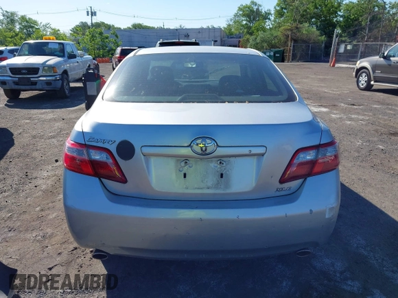 2007 Toyota Camry LE z VIN JTNBK46K473003622, wystawiony jako IAAI lot #42286264 z przebiegiem 105 630 mil mil oraz . Historia ofert i sprzedaży dostępna na DreamBid. Obrazek 17.