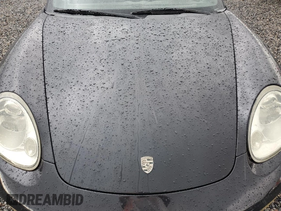2005 Porsche Boxster z VIN WP0CA298X5U712515, wystawiony jako Copart lot #74030354 z przebiegiem Nie podano mil oraz Szkoda całkowita • Salvage title. Historia ofert i sprzedaży dostępna na DreamBid. Obrazek 11.