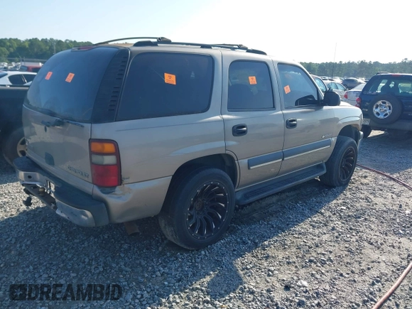 2003 Chevrolet Tahoe LS with VIN 1GNEC13V73J287501, listed as a IAAI auction lot 42508376 with Not provided miles and . Bid and sale history available at DreamBid. Image 4.