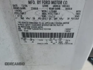 2007 Ford F-150 XL with VIN 1FTRF12W97KC13119, listed as a Copart auction lot 60927195 with 208,316 mi miles and Salvage title. Bid and sale history available at DreamBid. Image 12.