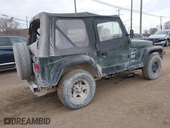 1998 Jeep Wrangler Sport with VIN 1J4FY19S9WP722431, listed as a IAAI auction lot 41872702 with 197,503 mi miles and . Bid and sale history available at DreamBid. Image 4.