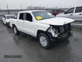 2022 Nissan Frontier Pro-4X z VIN 1N6ED1EK9NN608309, wystawiony jako IAAI lot #41417258 z przebiegiem 33 615 mil mil oraz . Historia ofert i sprzedaży dostępna na DreamBid. Obrazek 1.