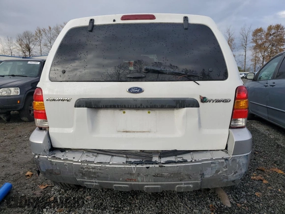 2005 Ford Escape Hybrid with VIN 1FMCU95H95KC74177, listed as a Copart auction lot 77361724 with 195,199 mi miles and Salvage title. Bid and sale history available at DreamBid. Image 6.