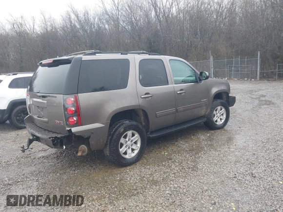 2011 GMC Yukon SLE with VIN 1GKS2AE0XBR249314, listed as a IAAI auction lot 41451903 with 249,673 mi miles. Bid and sale history available at carsss.com. Image 4.