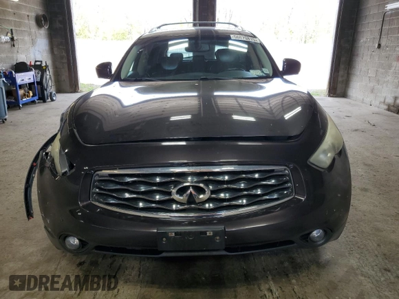 2011 Infiniti FX with VIN JN8AS1MW9BM733523, listed as a Copart auction lot 56670815 with 105,195 mi miles and Salvage title. Bid and sale history available at DreamBid. Image 5.