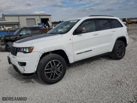 2019 Jeep Grand Cherokee Trailhawk with VIN 1C4RJFLT5KC645905, listed as a Copart auction lot 77326424 with 76,693 mi miles and Salvage Title. Bid and sale history available at carsss.com. Image 1.