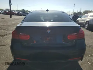 2015 BMW 3 Series 328i xDrive with VIN WBA3B3C59FJ985091, listed as a Copart auction lot 57658705 with 106,521 mi miles and Salvage title. Bid and sale history available at DreamBid. Image 6.