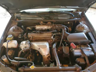 2001 Toyota Camry CE z VIN JT2BG22K610585062, wystawiony jako Copart lot #50842765 z przebiegiem 73 035 mil mil oraz Szkoda całkowita • Salvage title. Historia ofert i sprzedaży dostępna na DreamBid. Obrazek 11.