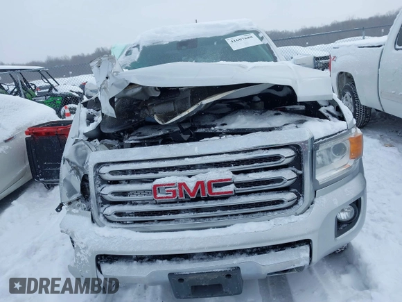 2015 GMC Canyon 4WD SLT with VIN 1GTG6CE36F1257975, listed as a IAAI auction lot 41607688 with 127,523 mi miles. Bid and sale history available at carsss.com. Image 6.