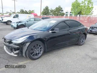 2019 Tesla Model 3 Mid Range with VIN 5YJ3E1EA3KF415601, listed as a IAAI auction lot 42125393 with 150,220 mi miles and . Bid and sale history available at carsss.com. Image 24.