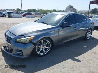 2014 Infiniti Q50 Premium with VIN JN1BV7AP5EM672766, listed as a IAAI auction lot 42107952 with 66,929 mi miles. Bid and sale history available at carsss.com. Image 2.