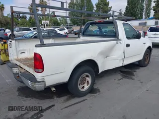 2000 Ford F-150 XL with VIN 1FTZF1724YNB21874, listed as a IAAI auction lot 42489948 with 117,906 mi miles and . Bid and sale history available at DreamBid. Image 4.