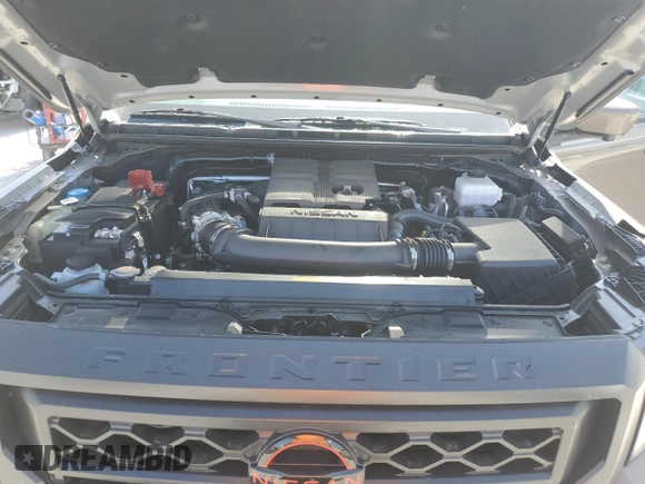 2023 Nissan Frontier Pro-4X with VIN 1N6ED1EK0PN668109, listed as a Copart auction lot 57064975 with 6,406 mi miles and Salvage title. Bid and sale history available at DreamBid. Image 11.